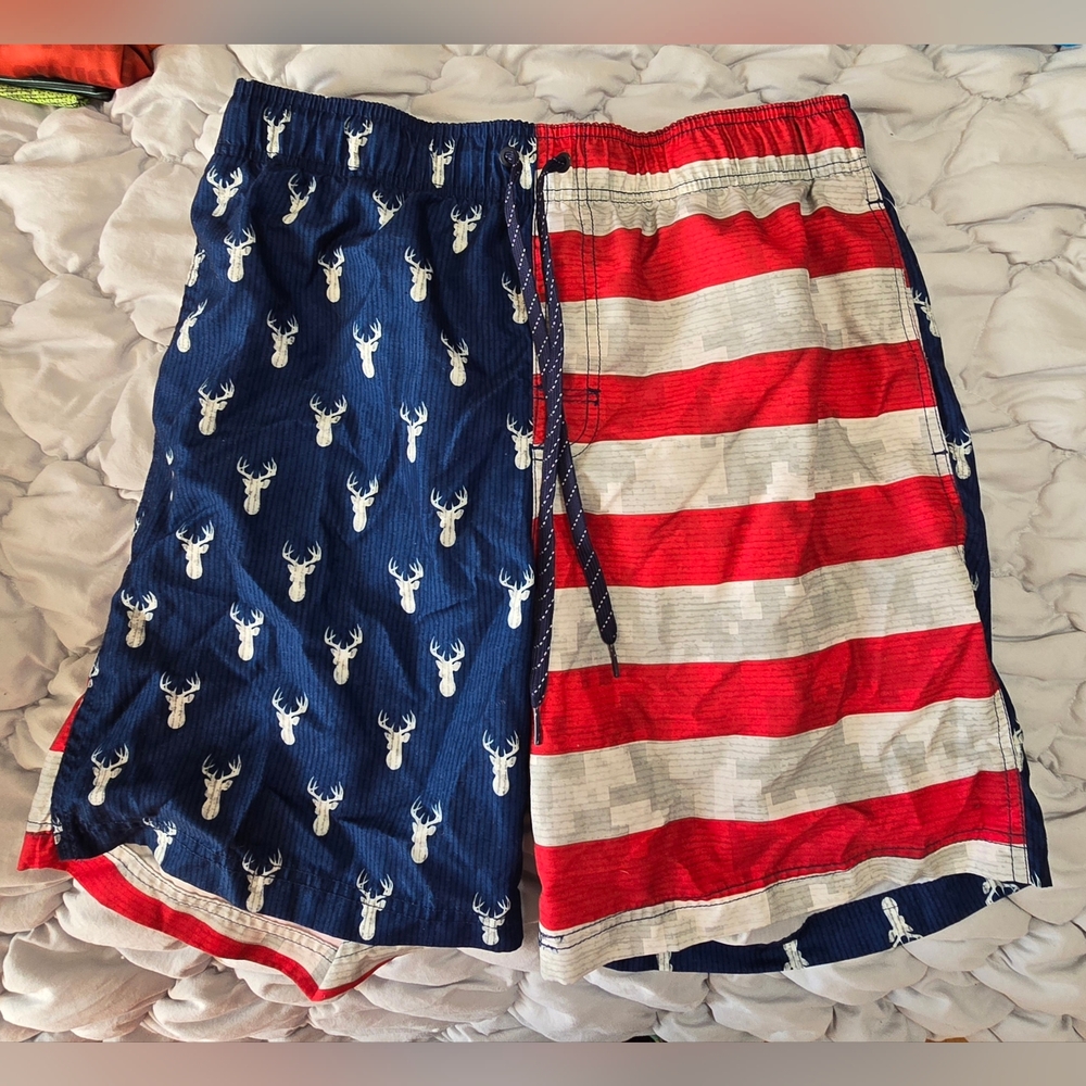 George Men's American flag and deer print swim trunks. 